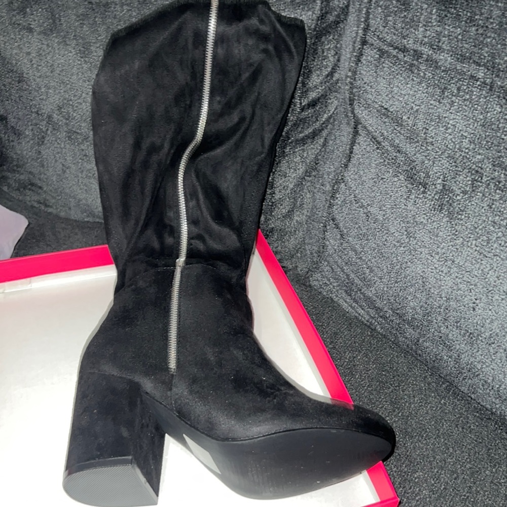 Lovely brand new thigh high covered boots.